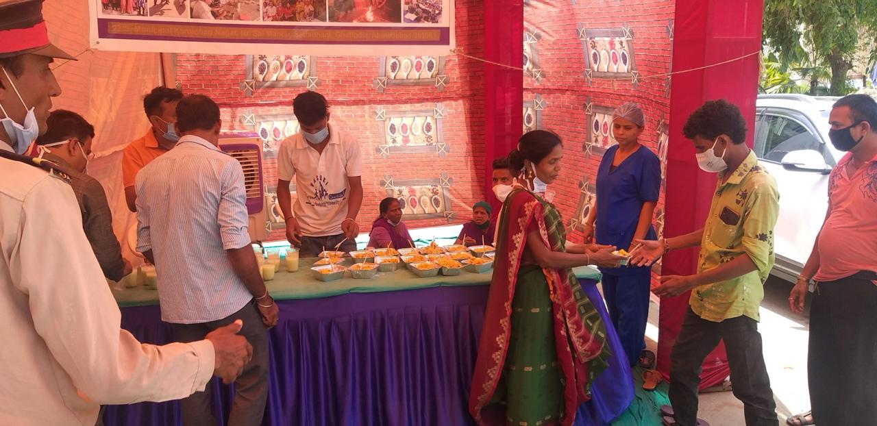 Volunteers serving food